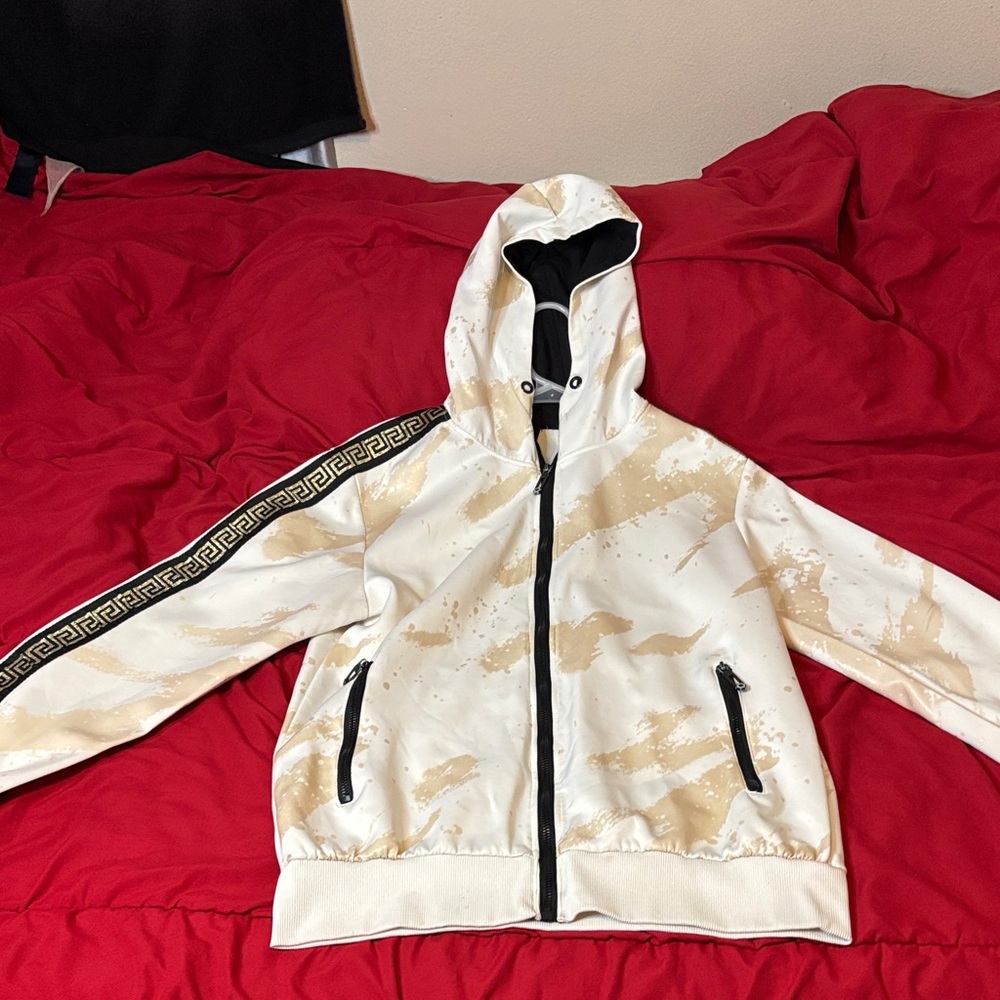 White and Gold Hooded Jacket with Black Accents from Paris France